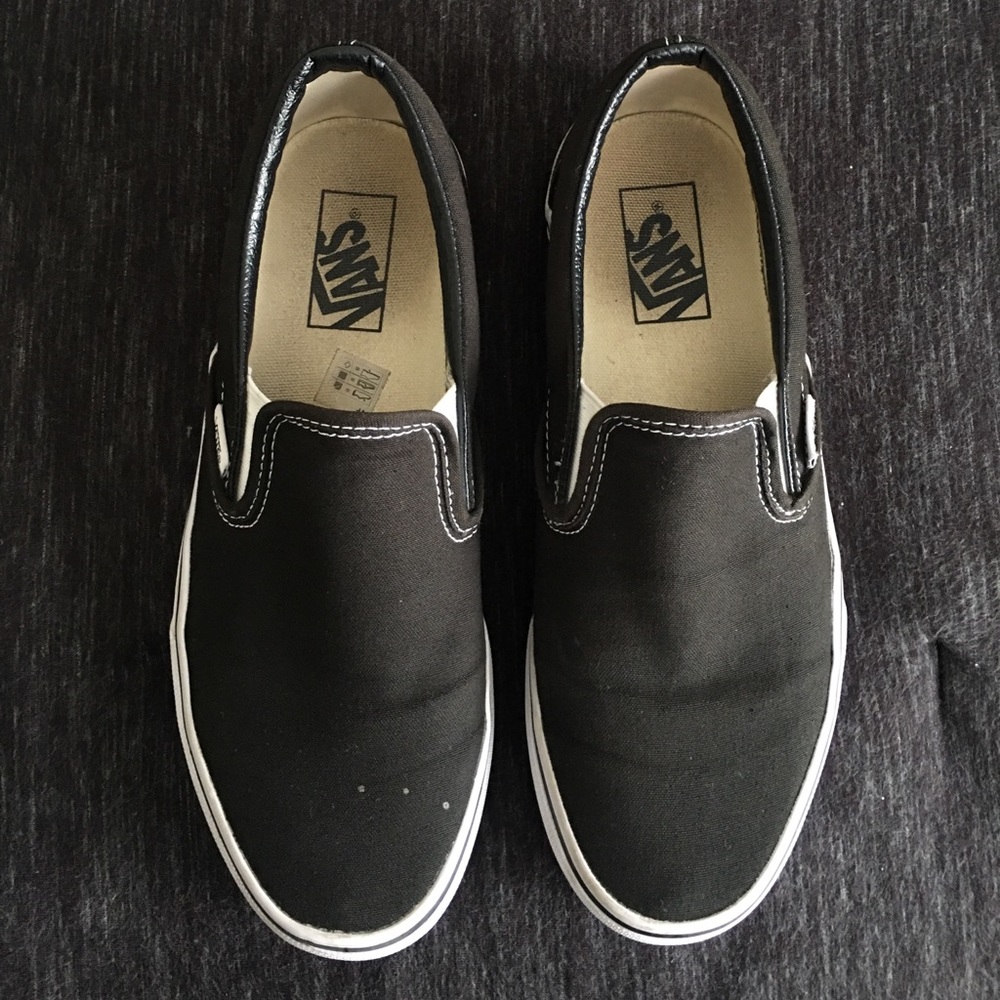 Vans classic black slip ons
